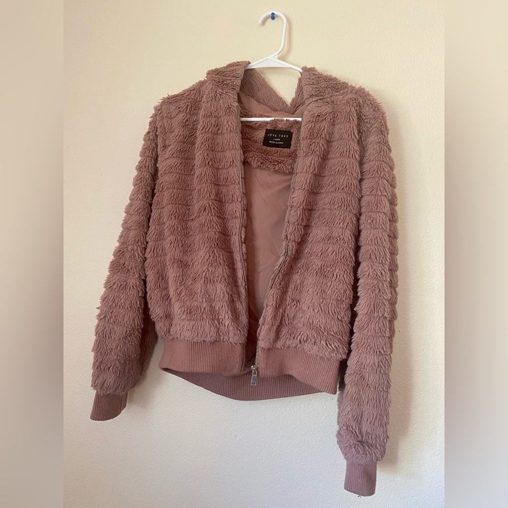 A cute pink fur jacket for winter